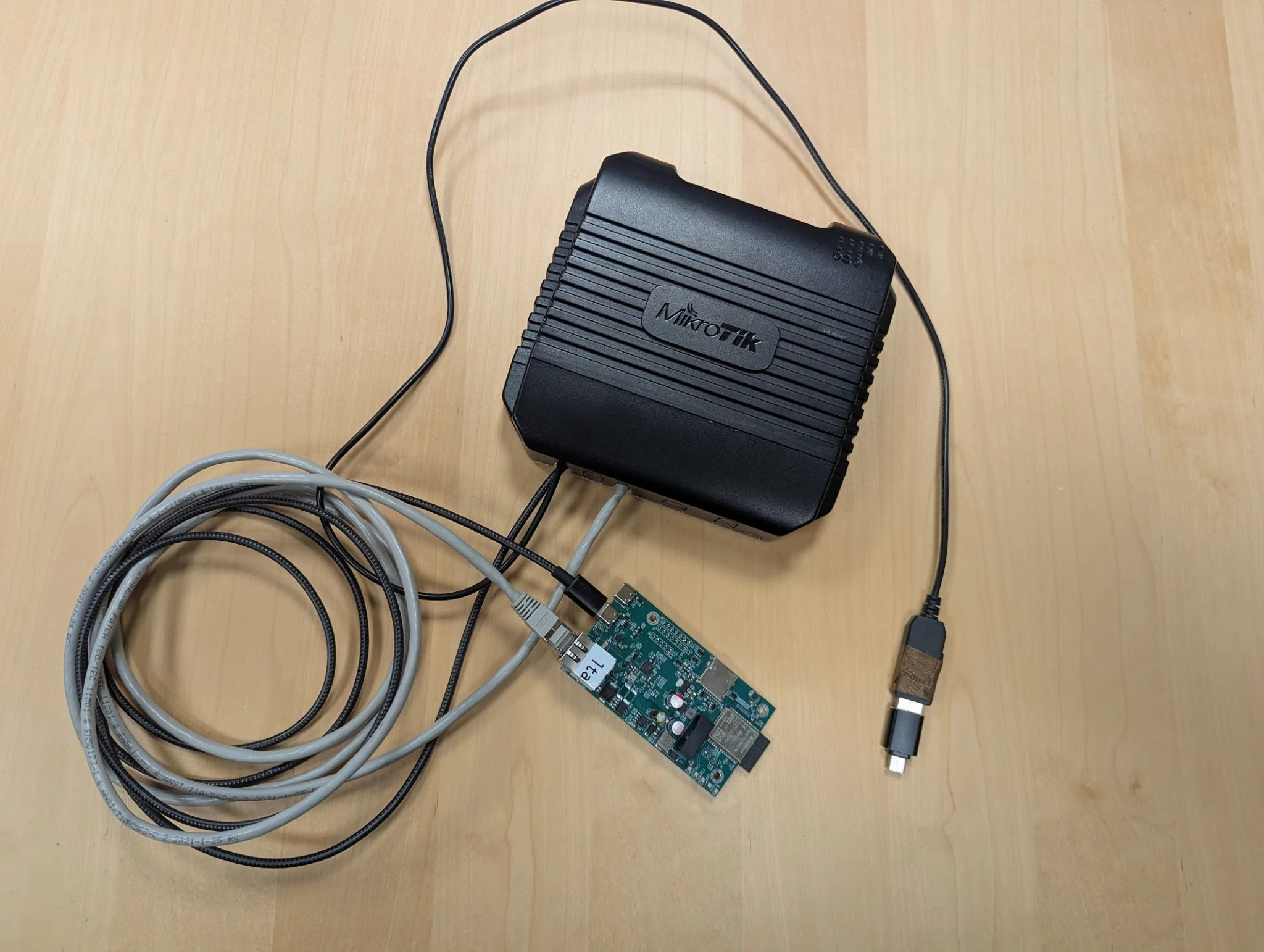 ESP32-C5 C-ITS receiver connected to a Mikrotik 4G LTE router for upstream connectivity