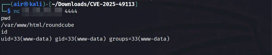 Terminal screenshot showing a netcat reverse shell connection after successful Roundcube RCE