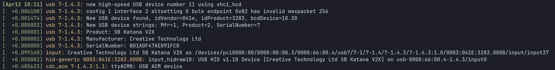 Linux dmesg output showing the unmodified Katana V2X enumerating as a USB HID Consumer Control device