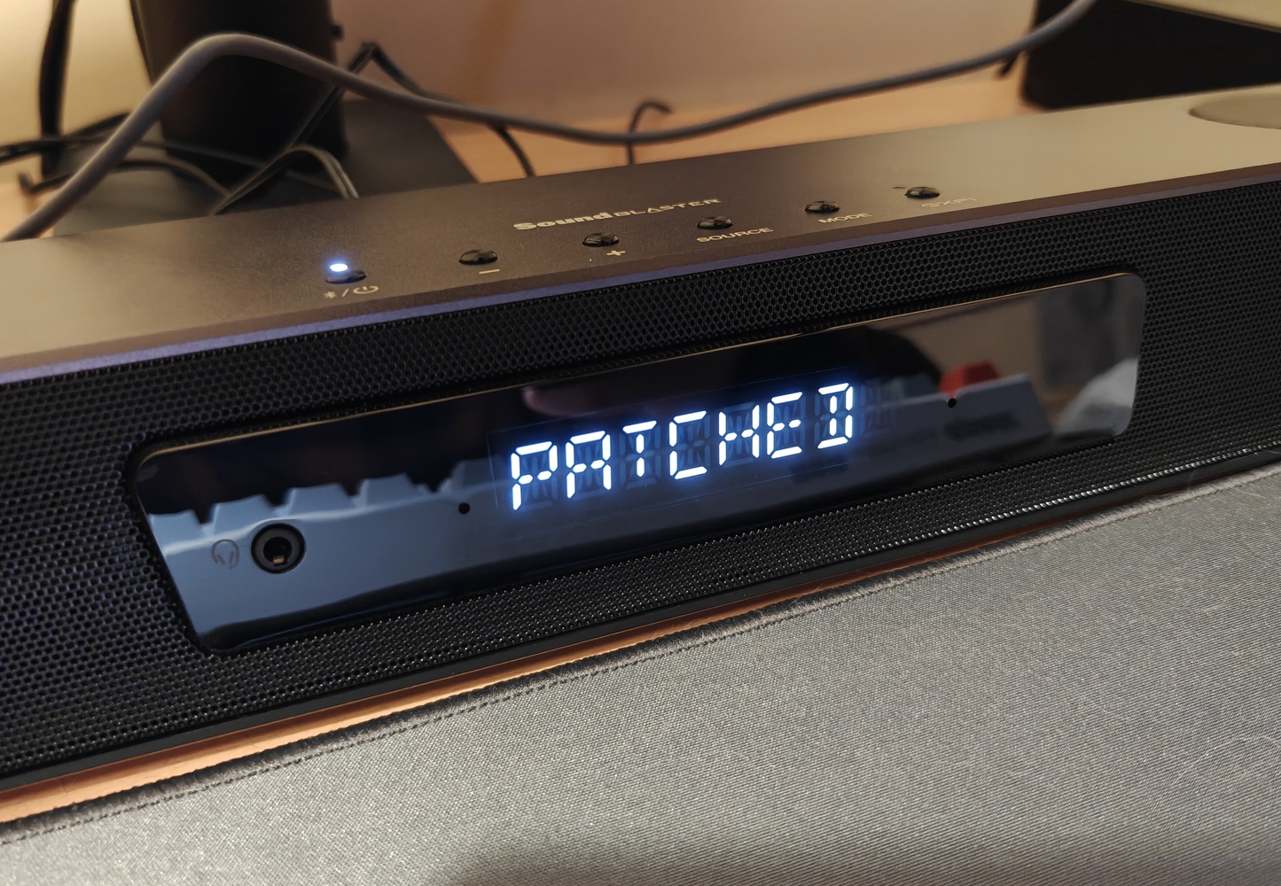 Front segment display of the Creative Sound Blaster Katana V2X showing the text PATCHED after a custom firmware was flashed