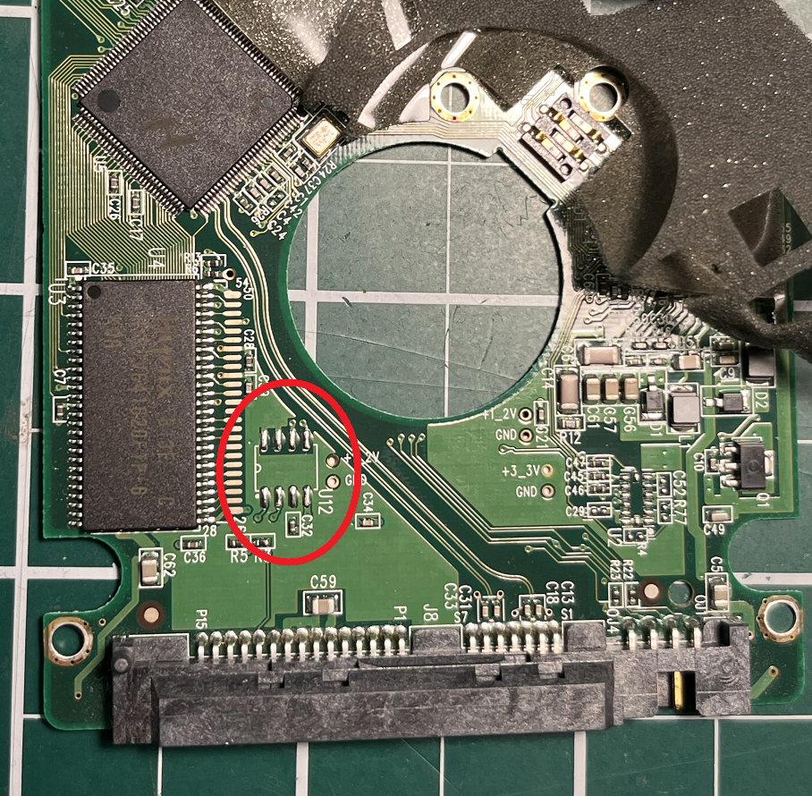 Western Digital HDD circuit board showing SPI flash chip pads location for soldering external flash chip for firmware recovery