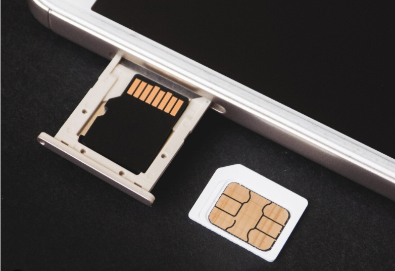 CATAnA: Exploring the Dangers of SIM-Originating AT Commands in Cellular Devices